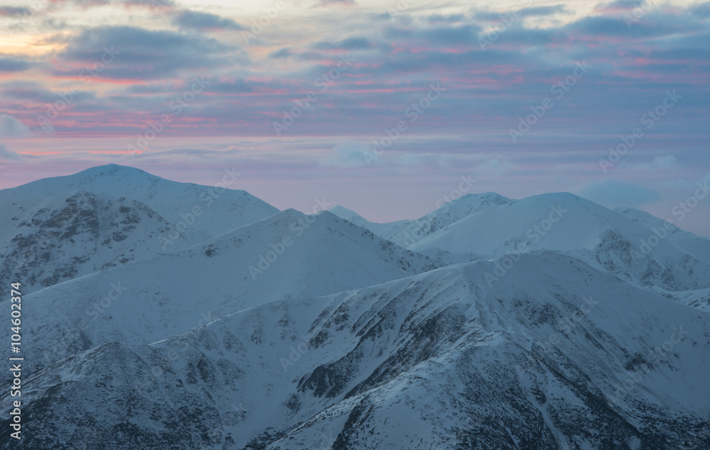 Obraz premium Colorful mountain sunset panorama at winter in Western Tatras