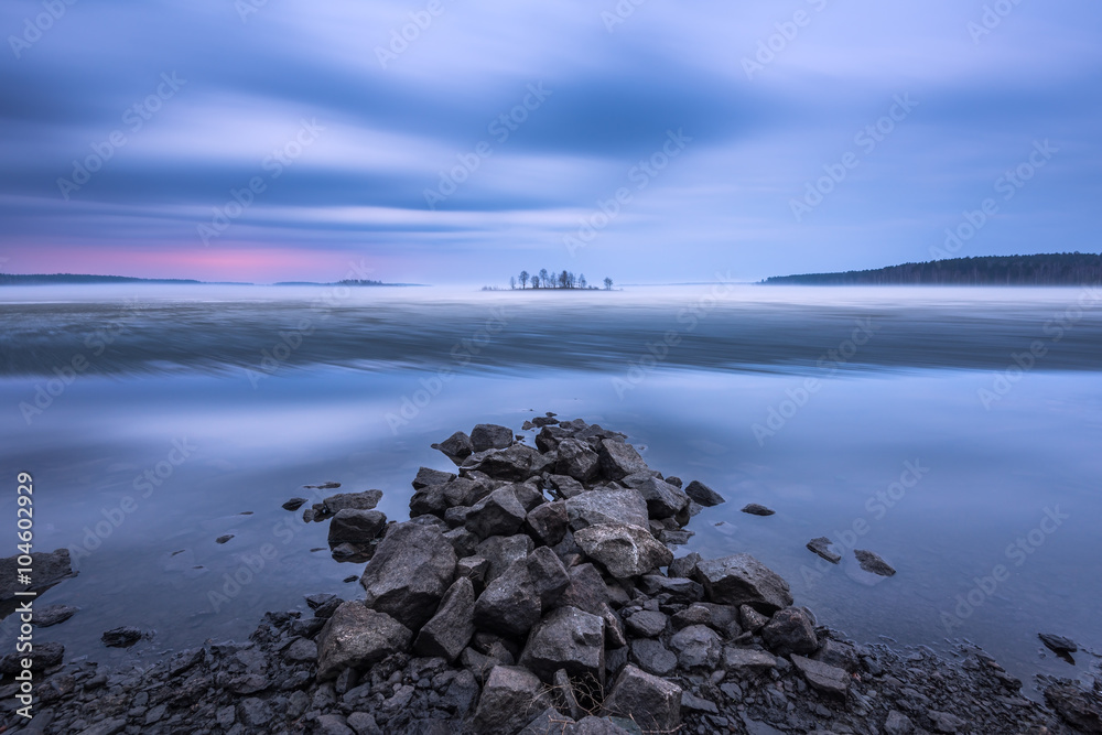 Fototapeta premium Spring, mist over the lake