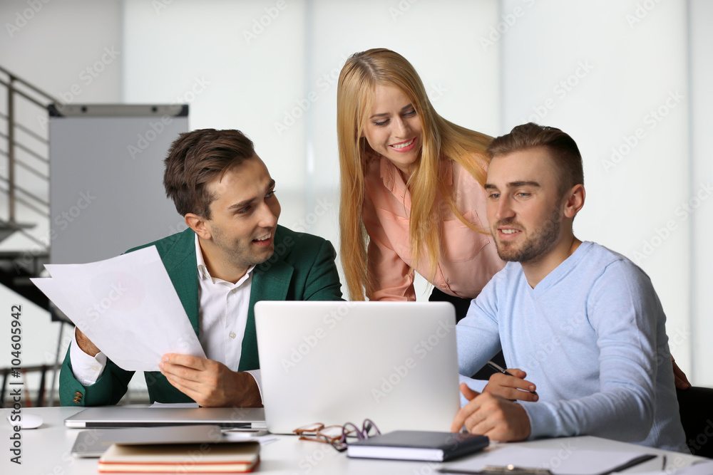 Young business people discussing a new project at the meeting in a conference room Young business people discussing a new project at the meeting in a conference room