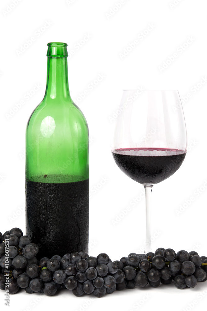 Bunch of grapes, bottle of wine and wineglass