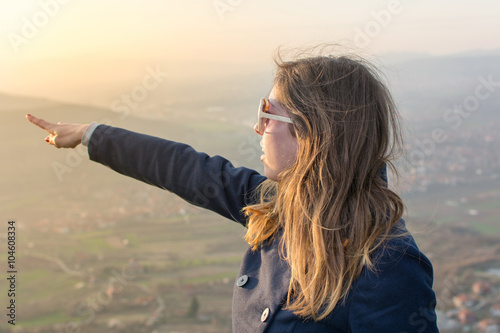 Girl on hiking trip enjoying the view