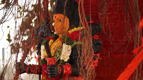 God statue in the temple photo