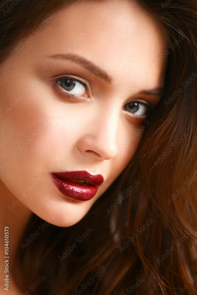 Portrait of beautiful woman , isolated on gray background Portrait of beautiful woman , isolated on gray background