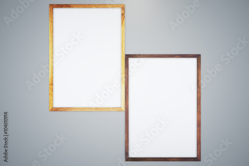 Two blank frames on gray background