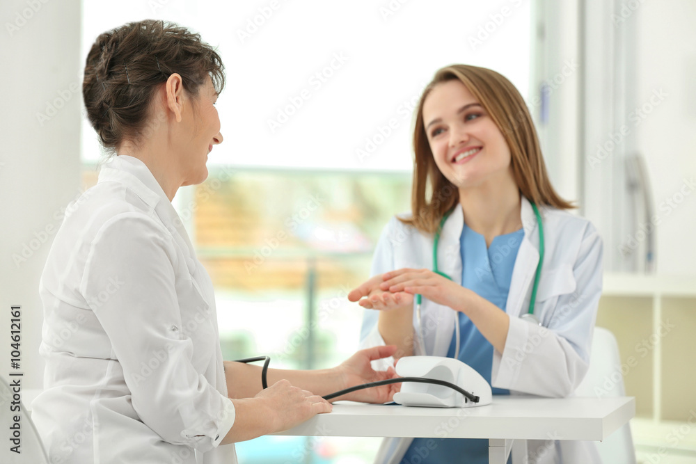 Fototapeta premium Doctor and patient in office