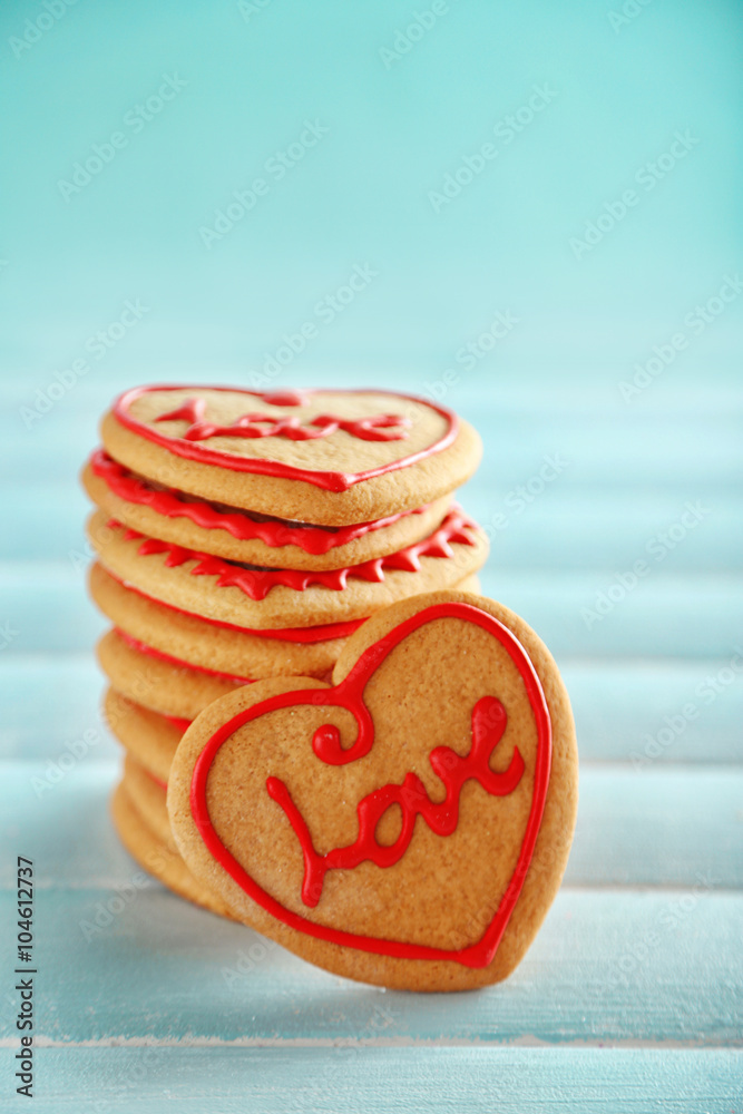 Assortment of love cookies on blue background, closeup Assortment of love cookies on blue background, closeup