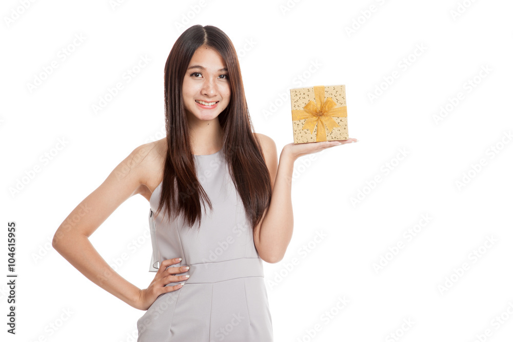 Beautiful young Asian woman with golden gift box Beautiful young Asian woman with golden gift box