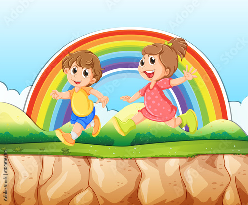 Boy and girl running on the cliff