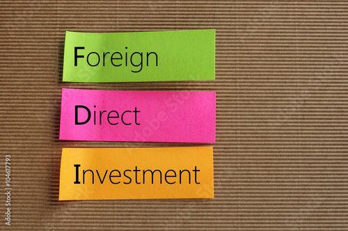 Foreign Direct Investment (FDI) text on colorful sticky notes