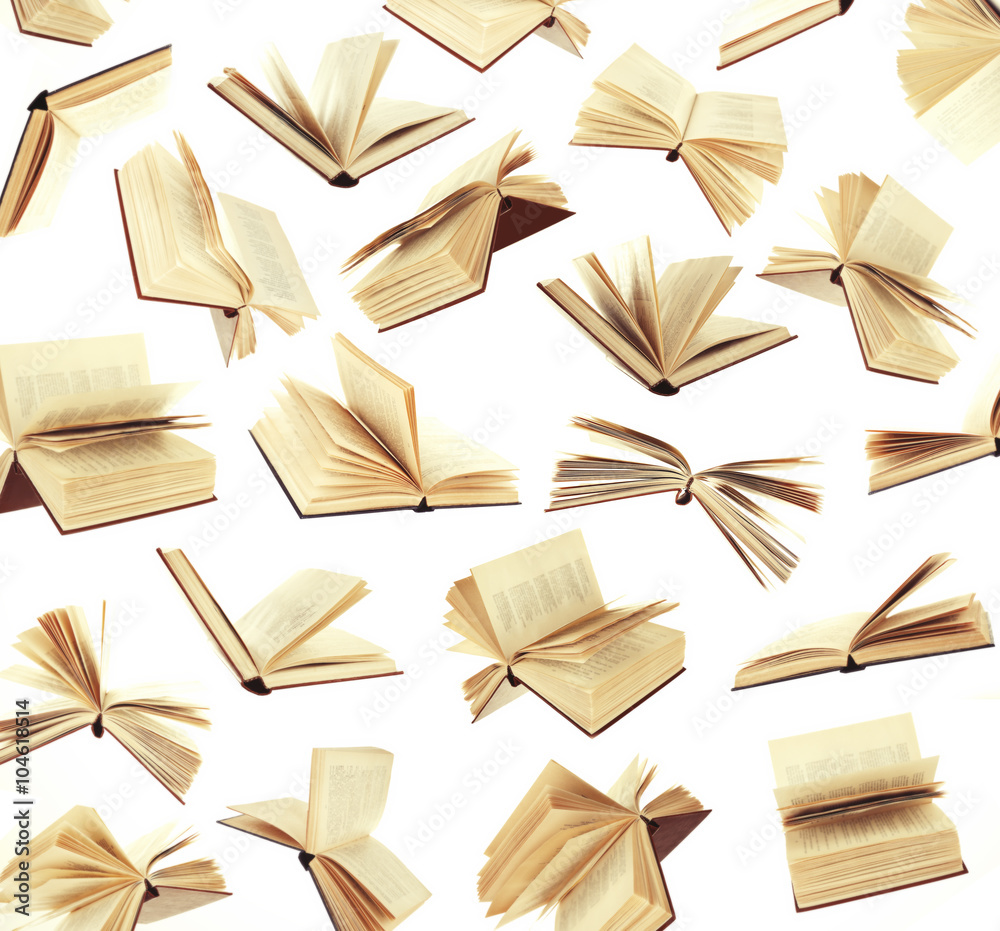 Obraz premium Many flying books as background isolated on white