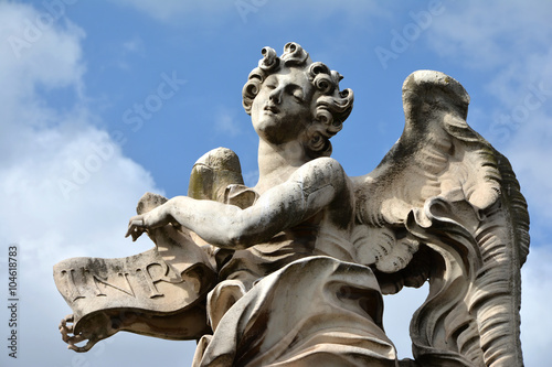 Angel in ectasy with INRI sign from Ponte Sant Angelo  in Rome