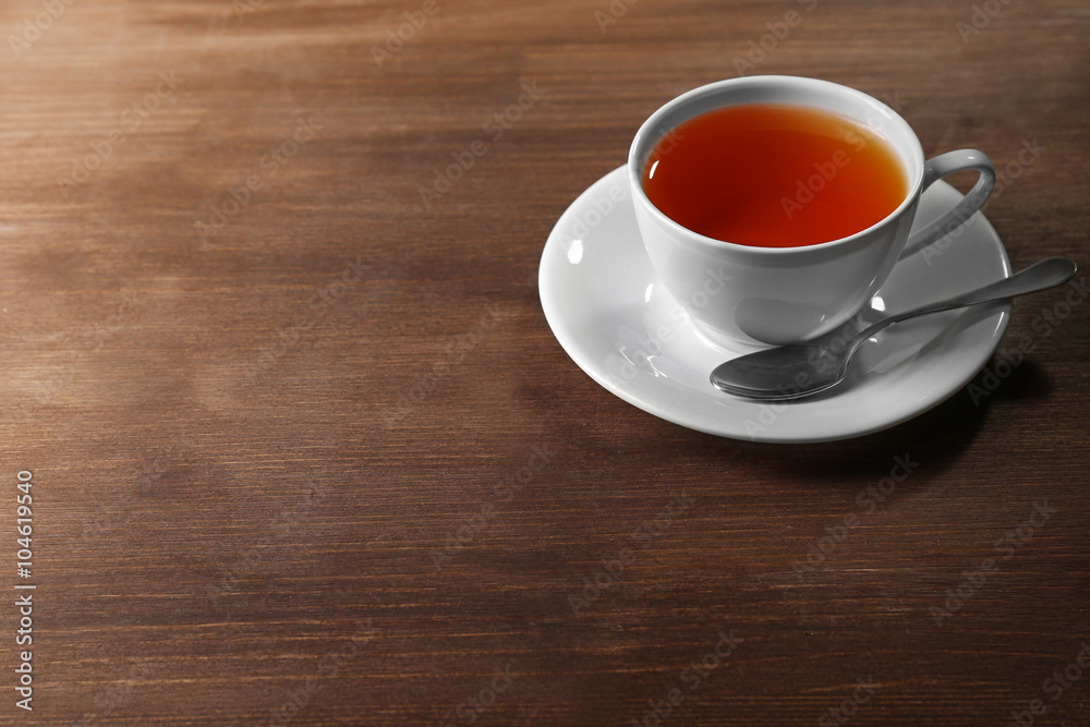 Cup of tea on wooden table Cup of tea on wooden table