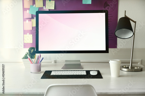 Stylish workplace with comp...