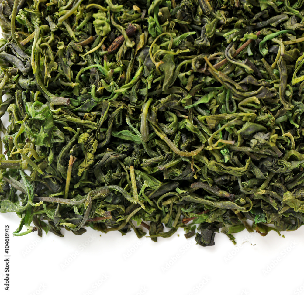Pile of green dry tea, isolated on white