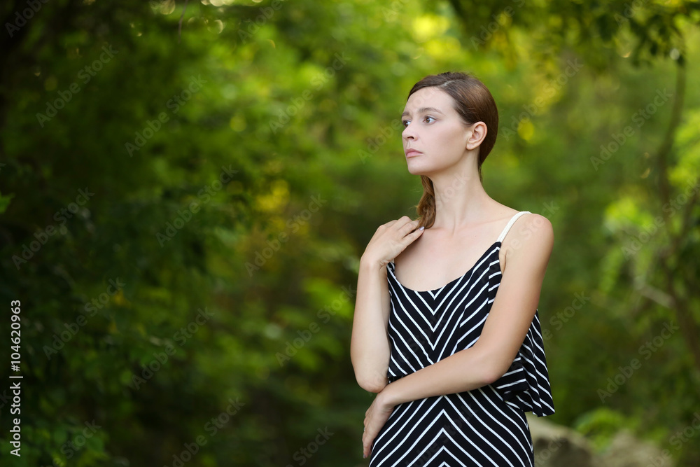 Caucasian girl relaxing and enjoying life in forest's fresh air Caucasian girl relaxing and enjoying life in forest's fresh air