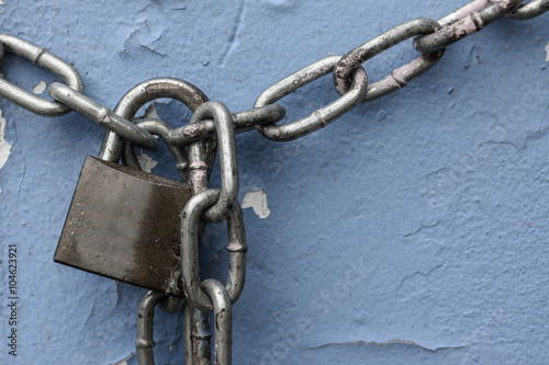 Vignette old key and rusty chain. Vignette lock key and chain.