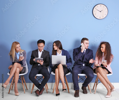 Young people sitting on a c...