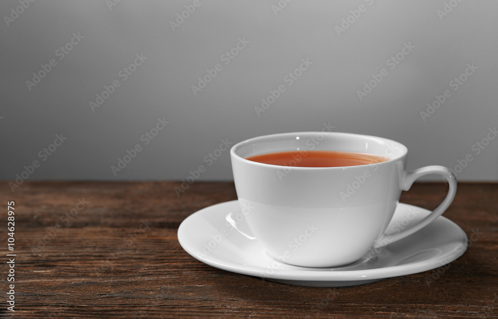 Cup of tea on wooden table Cup of tea on wooden table