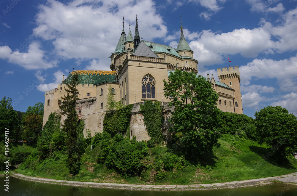 View on medieval Bojnice castle with gothic tower and colorful roof near Prievidza city,Slovakia