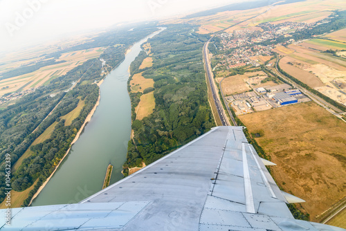 Airplane Wing On The Window With Landscape View