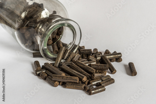 A glass of torrefied wood pellets photo