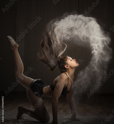Ballerina dancing with flour
