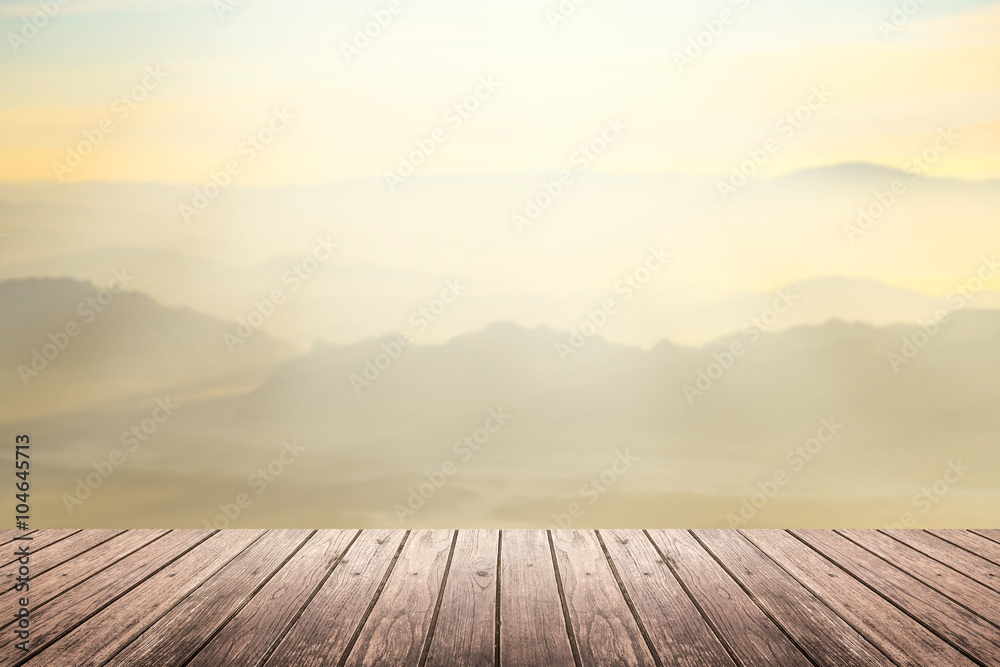 wooden floor with mountain blurred background