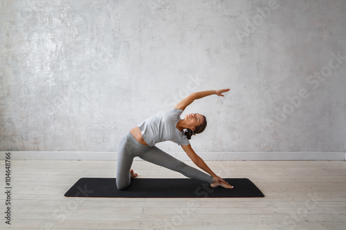 Woman practicing advanced yoga. A series of yoga poses