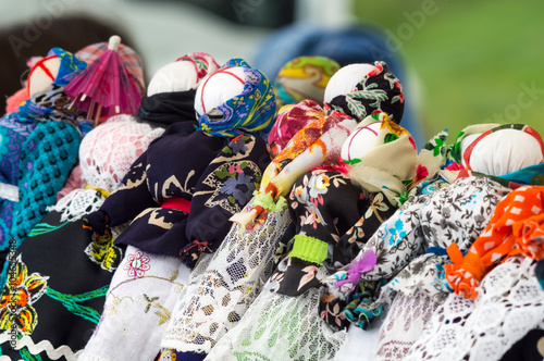 Ukrainian traditional dolls motanka on a fair photo