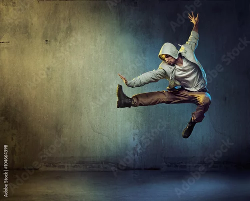 Obraz Sportowy tancerz w skokowej pozie