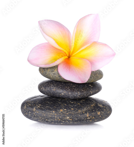 zen stones with frangipani flower on white background