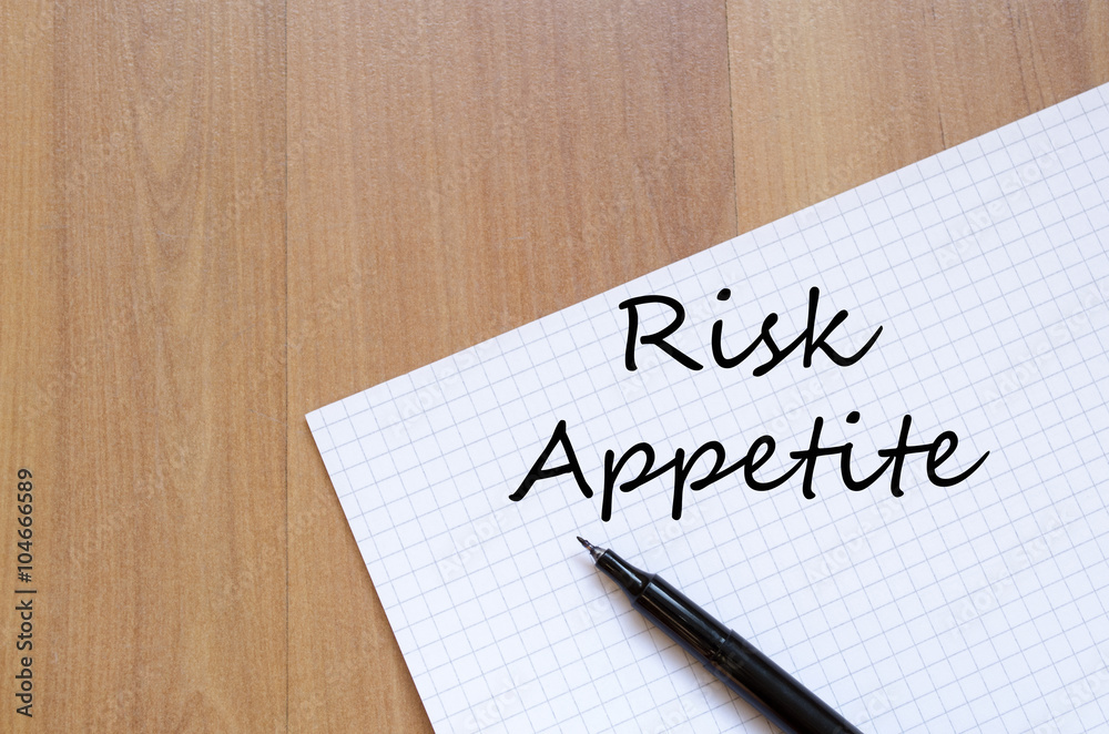Risk appetite write on notebook Risk appetite write on notebook