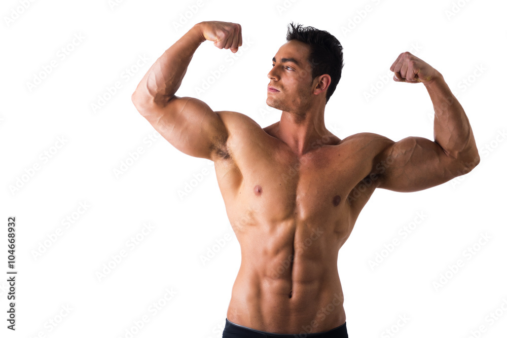Handsome bodybuilder doing classic double biceps pose Handsome bodybuilder doing classic double biceps pose