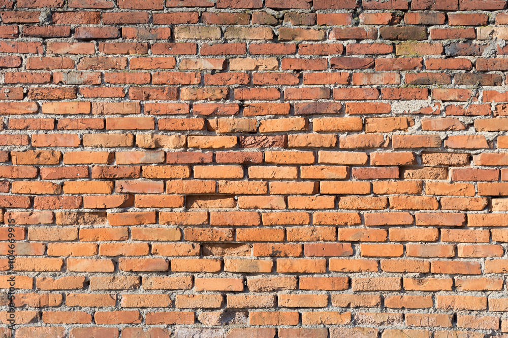 Naklejka premium Background of red brick wall pattern texture.