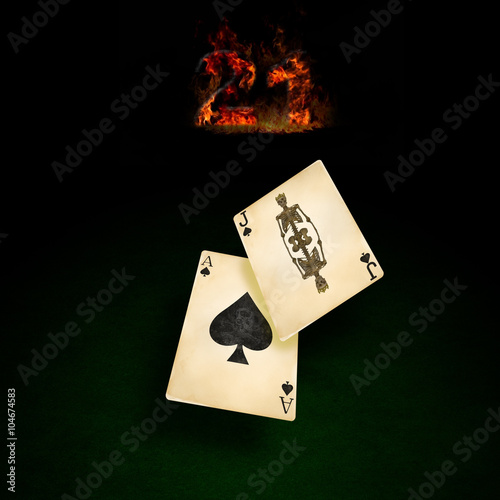 Blackjack card game/Two playing cards showing black jack