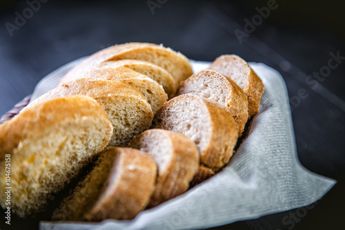 sliced bread in the basket, black and white bread