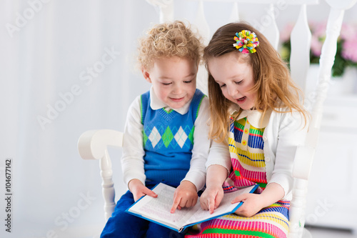 Kids reading a book
