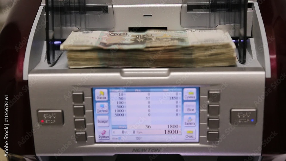Counting and checking of dollars US on electronic calculating machine Counting and checking of dollars US on electronic calculating machine