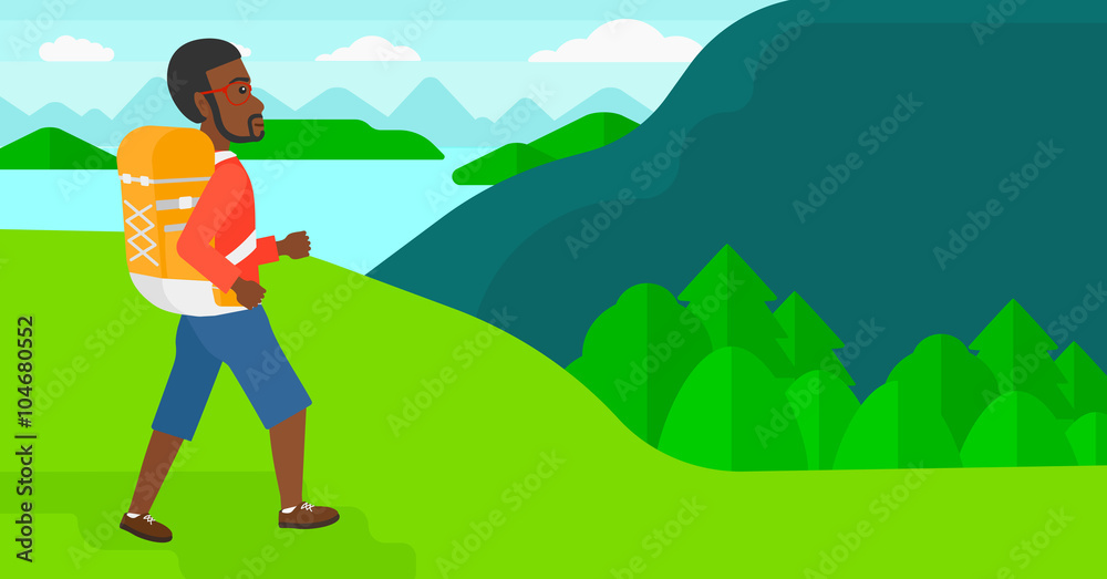 Man with backpack hiking.