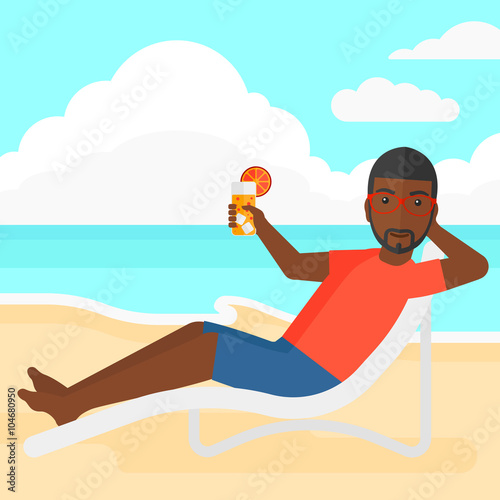 Man sitting in chaise longue.