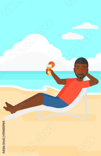 Man sitting in chaise longue.