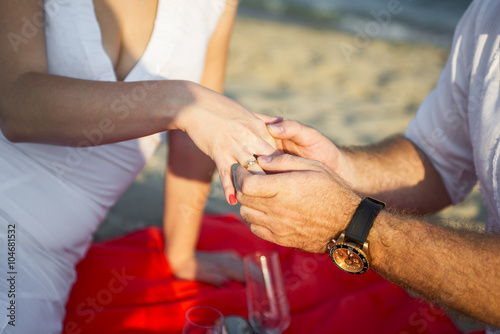 Marriage Proposal at sunset tropical beach