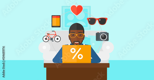 Man shopping online using his laptop.