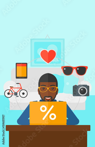 Man shopping online using his laptop.