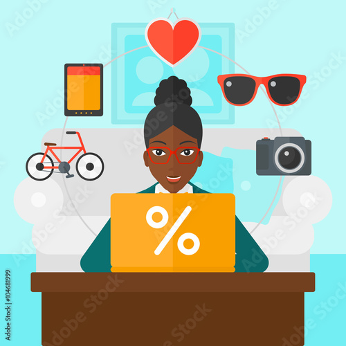 Woman shopping online using her laptop.
