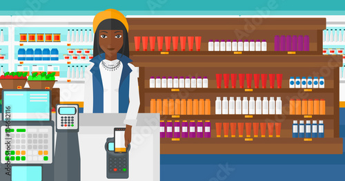 Customer paying with smartphone using terminal.