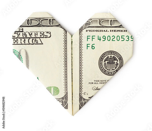 One hundred dollars folded into heart isolated