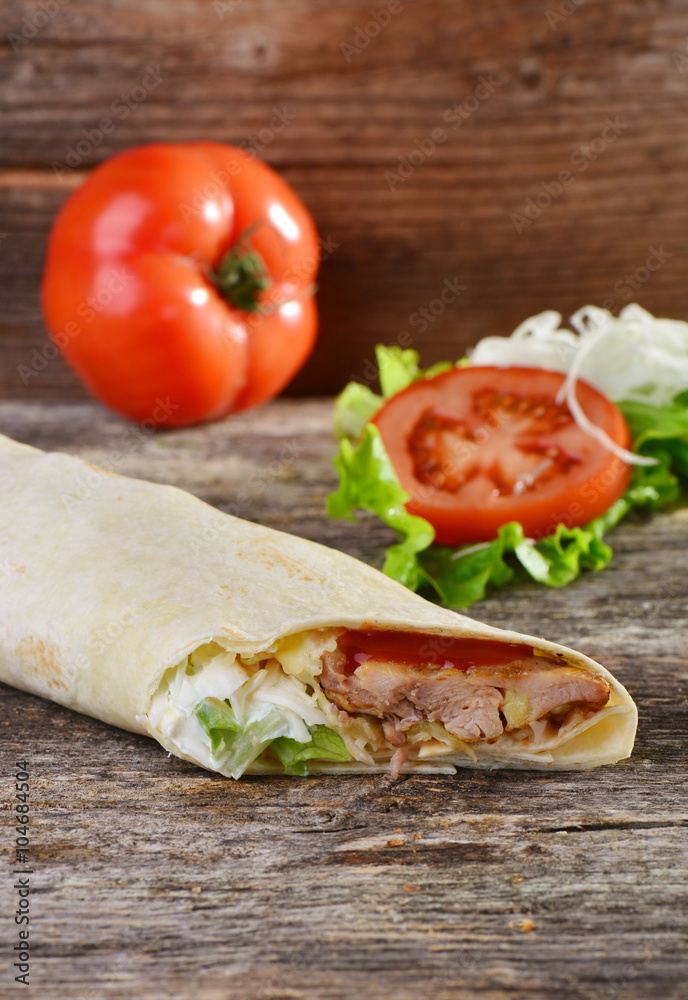 chicken wrap in tortilla with sauce chicken wrap in tortilla with sauce