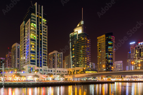 city Dubai marina in a summer night panorama of skyscrapers