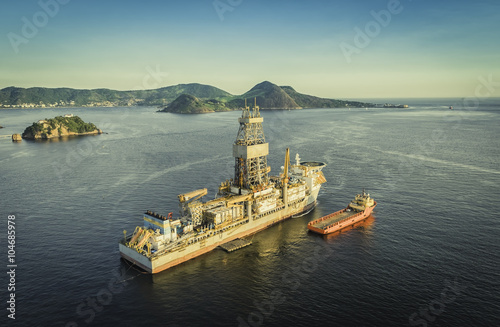 Offshore Oil drilling rig against panorama of Rio De Janeiro photo